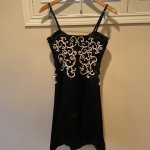 Stunning black/white cocktail dress size 4